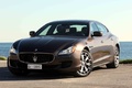 Maserati Quattroporte MY2013 marron 3/4 avant gauche debout