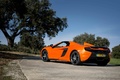 McLaren 650S Spider orange 3/4 arrière gauche penché