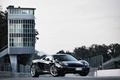 McLaren MP4-12C noir 3/4 avant droit