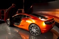 McLaren MP4-12C orange 3/4 arrière gauche portes ouvertes