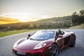 McLaren MP4-12C Spyder bordeaux 3/4 avant gauche debout