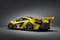 McLaren P1 GTR jaune/vert 3/4 arrière gauche