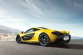 McLaren P1 jaune 3/4 arrière gauche