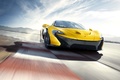 McLaren P1 jaune face avant travelling penché