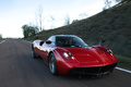 Pagani Huayra bordeaux 3/4 avant droit travelling 3