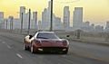 Pagani Huayra rouge 3/4 avant droit travelling 3