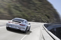 Porsche 911 Carrera 4 GTS - Grise - 3/4 arrière droit dynamique