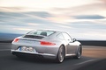 Porsche 991 Carrera S gris 3/4 arrière droit travelling penché