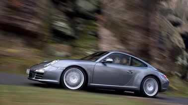 Porsche 997 Carrera 4 MkII anthracite profil travelling penché