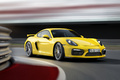 Porsche Cayman GT4 jaune 3/4 avant droit travelling