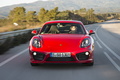 Porsche Cayman S II rouge face avant travelling