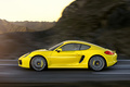 Porsche Cayman S jaune profil travelling