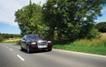 Rolls Royce Ghost EWB bordeaux 3/4 avant droit travelling penché
