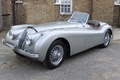 Jaguar XK 120 Roadster, grise 3-4 avg