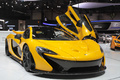 Salon de Genève 2013 - McLaren P1 jaune 3/4 avant droit porte ouverte