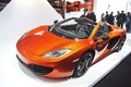 Mondial de l'Automobile de Paris 2012 - McLaren MP4-12C Spider orange 3/4 avant gauche