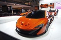 Mondial de l'Automobile de Paris 2012 - McLaren P1 orange 3/4 avant gauche