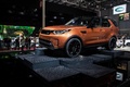 Mondial de l'Automobile de Paris 2016 - Land Rover Discovery V orange 3/4 avant gauche