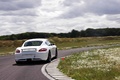 Porsche Cayman Cup blanc 3/4 arrière droit travelling 3