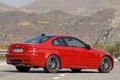 BMW M3 coupé rouge 3/4 arrière